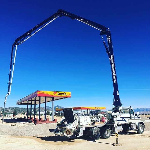 Concrete boom extended for slab pour at Love's gas station