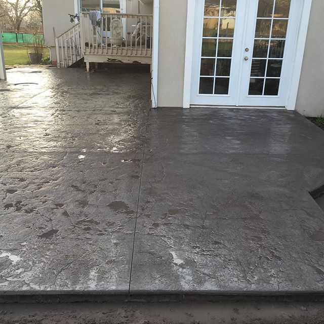 View of beautiful stamped concrete patio after completion